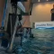 aquabike rieux : vélo aquatique dans un bassin, surveillant au bord